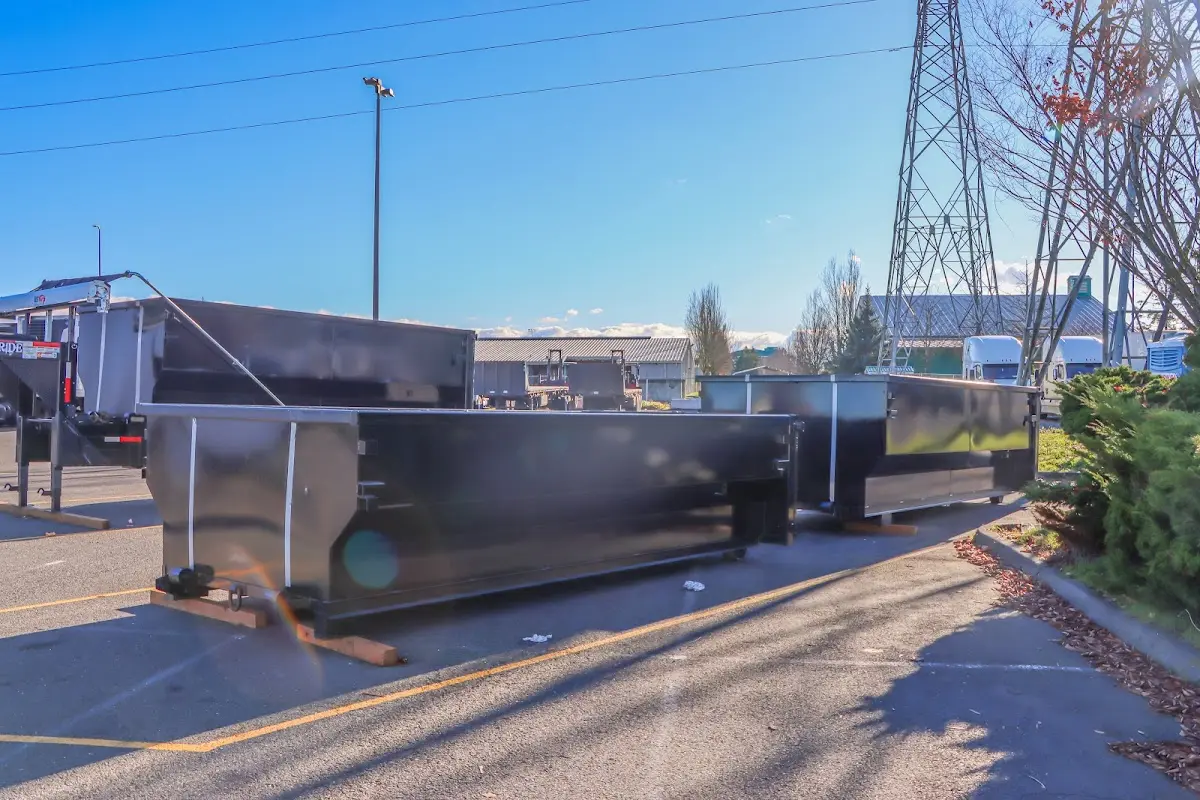 Roll-off dumpster ready for waste disposal at job site for 2 Yard Dumpster Rental in Fruitville